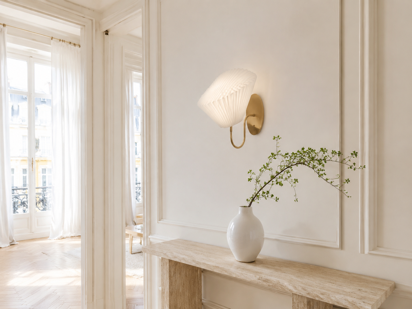 Linen, travertine, brass and ribbed glass lighting materials