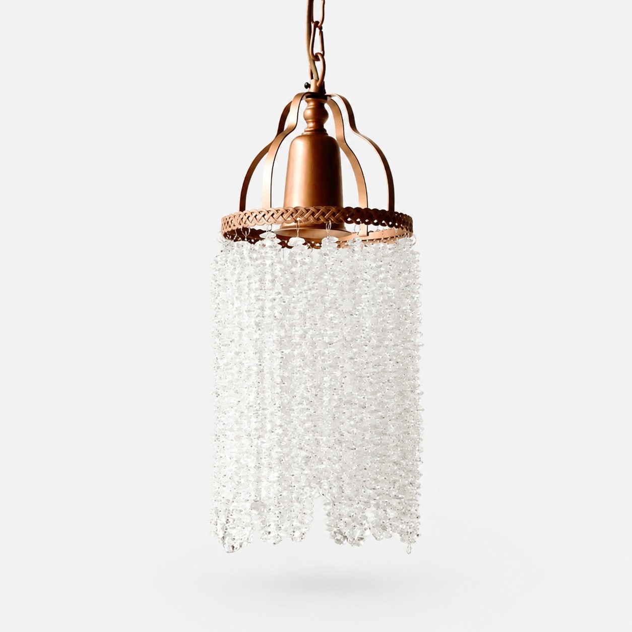 Small vintage crystal fringe pendant chandelier on a white background