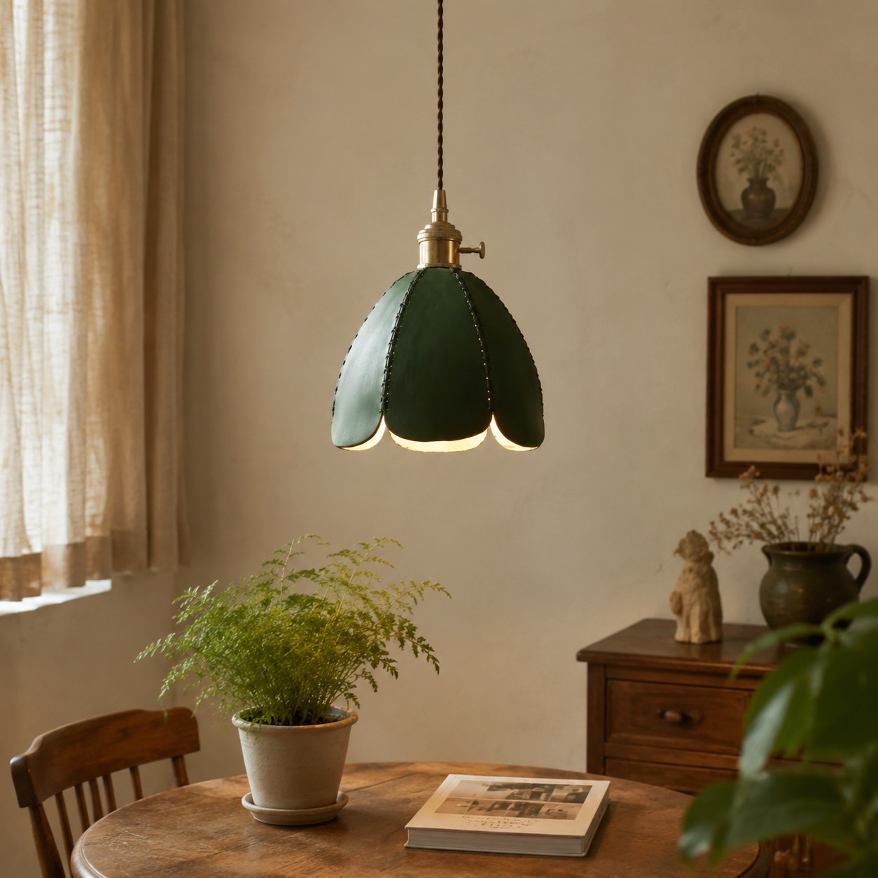 Green leather petal pendant light in a quiet dining corner