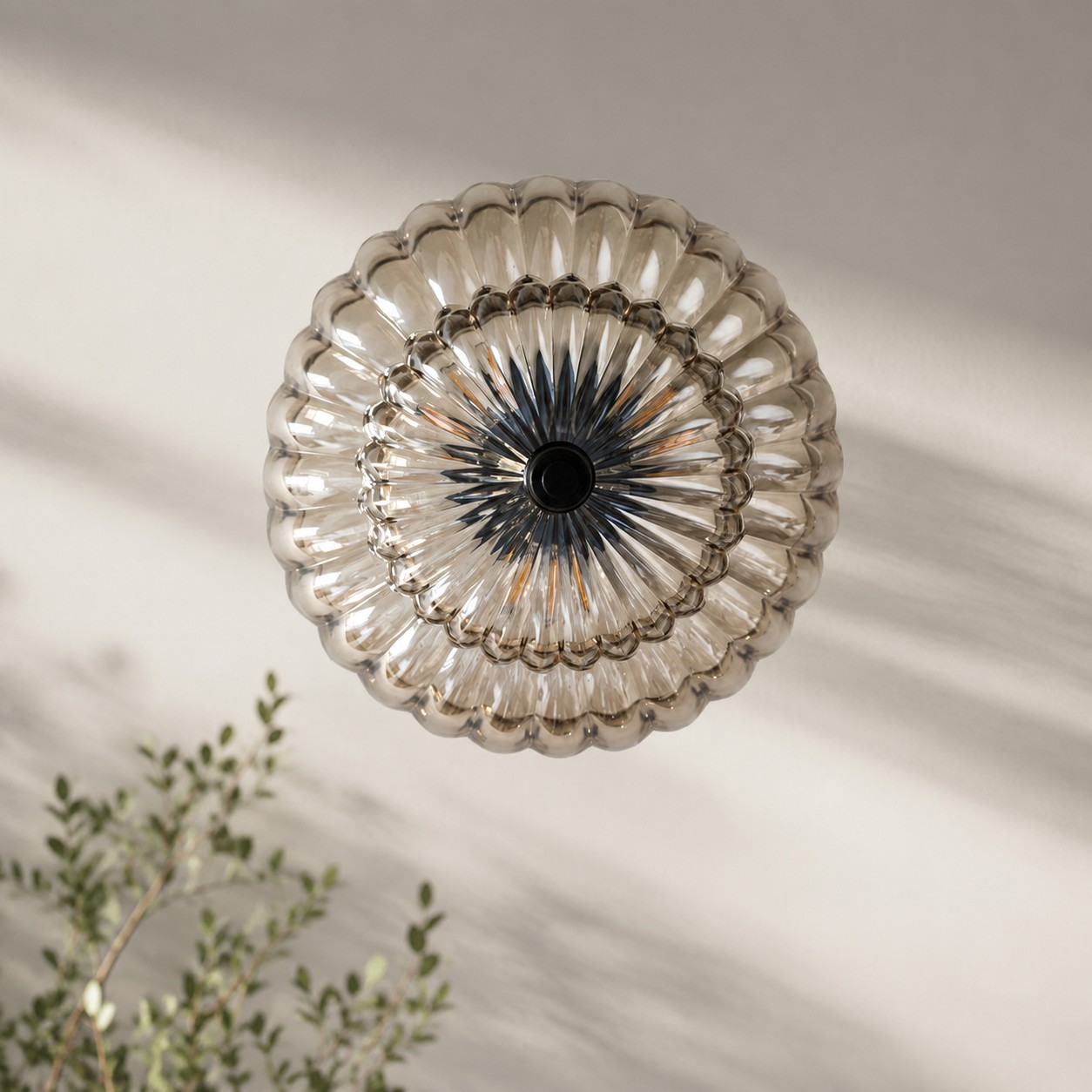 Overhead view of the flower-like fluted glass ceiling light