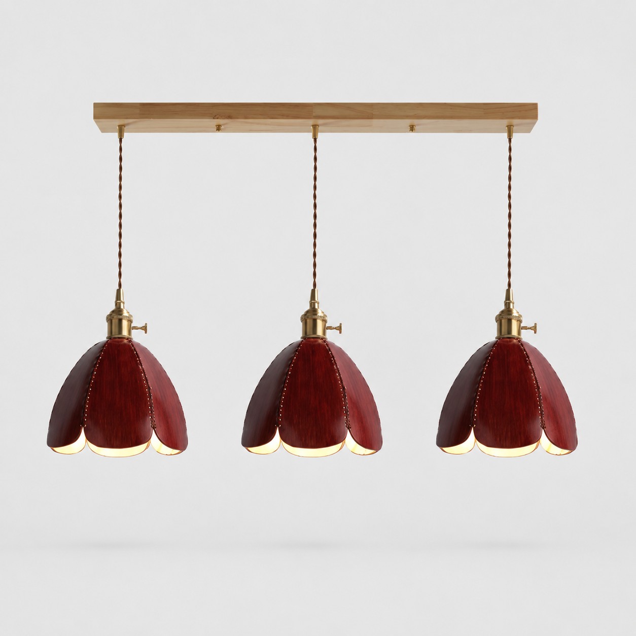 Three-light brown leather linear pendant