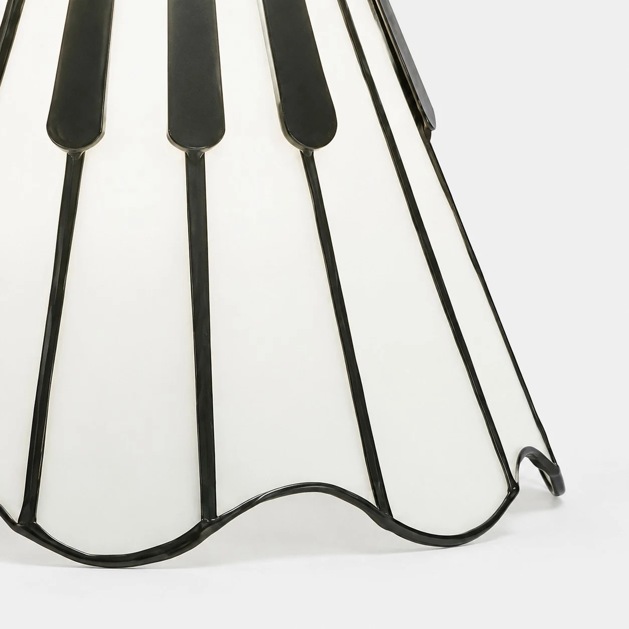 Fluted black metal shade edge detail