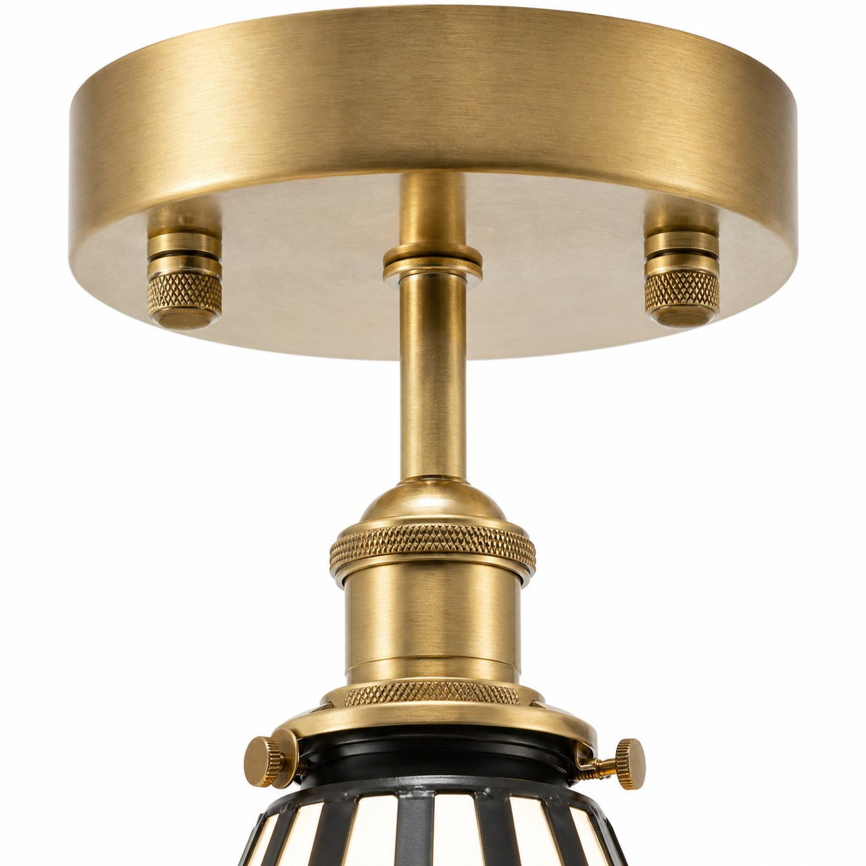 Antique-brass ceiling canopy and lamp holder detail