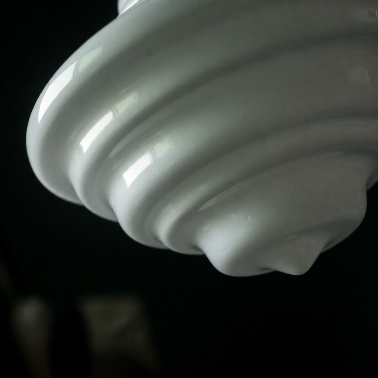 Glossy layered glass pendant detail