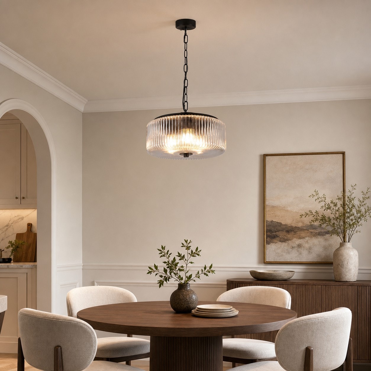 Ribbed glass pendant ceiling lamp above a dining table