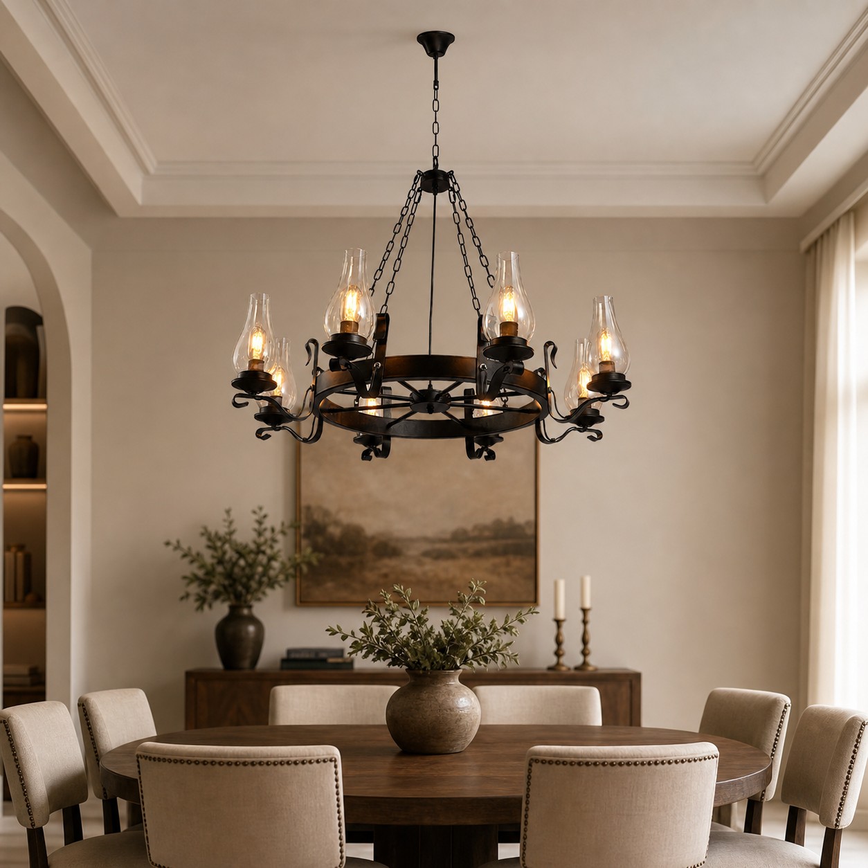 Eight-light wagon wheel chandelier above a large round dining table